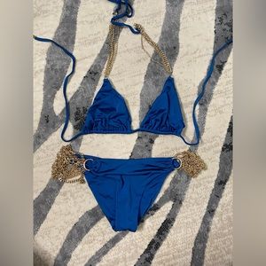 Beach Bunny swimwear. With gold detail.